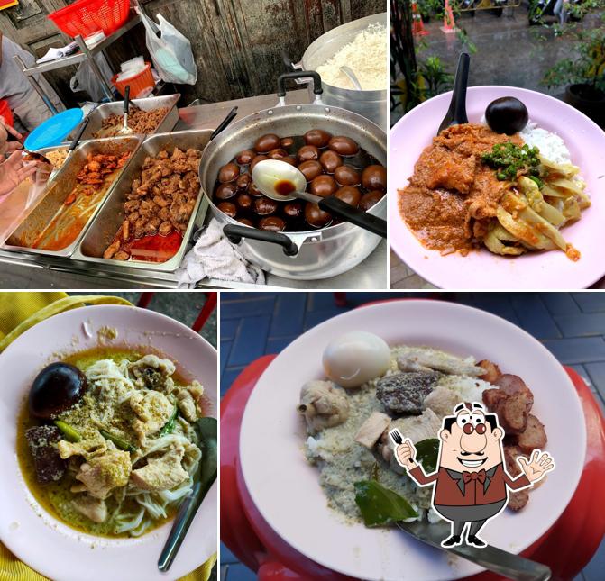 ถาดแกงและหม้อไข่พะโล้หลายอย่างที่หน้าร้านข้าวแกงเจ๊กปุ้ย เยาวราช