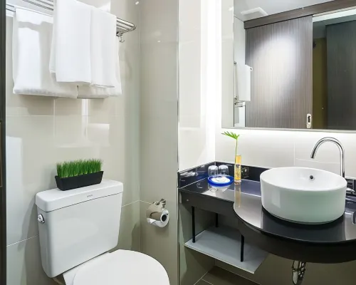 ห้องพักของ Aim House Bangkok แอร์ ทีวีจอแบน ตู้เย็น Wi-Fi ฟรี ย่านคลองสาน