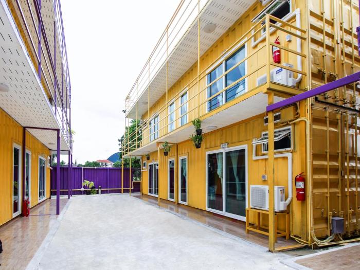 Exterior walkway and container room units at 5 Chang Palace Hotel, Soi Ram Intra 5, Bang Khen