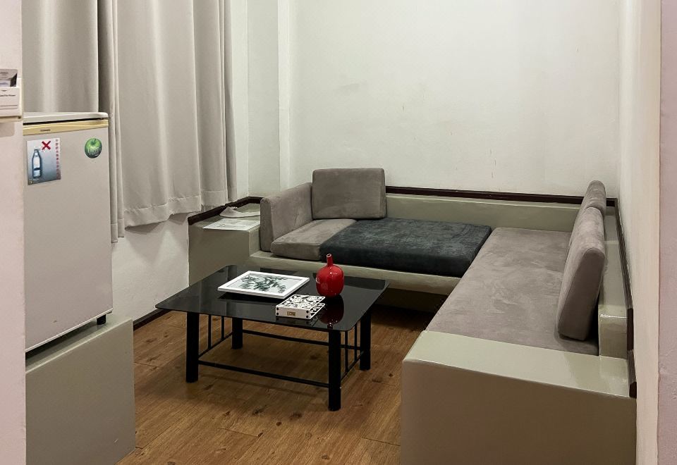 Guest room at Anda Ramkhamhaeng By St James — clean white bedding, king-size bed, renovated interior