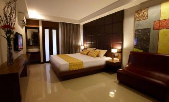 Guest room at Collection O Bangkok Cha Cha Suite with private balcony, Chokchai 4 Soi 27