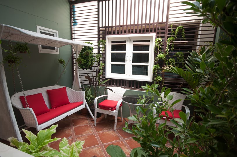 Standard room at Cozy at 9 Hotel Bangkok — clean bed, air-con, free Wi-Fi
