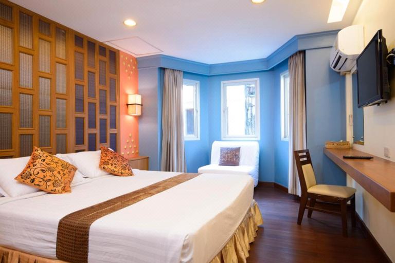 ห้องพัก Golden Grand Deluxe ของ Golden House กรุงเทพ พร้อมทีวีและเฟอร์นิเจอร์มาตรฐาน 3 ดาว