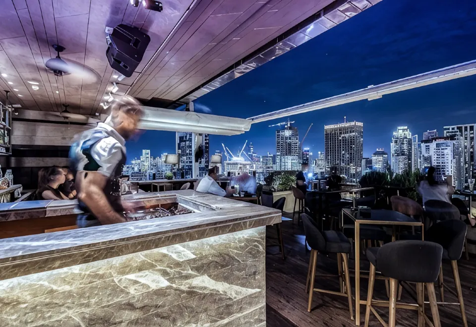 24th-floor infinity pool at Hotel Indigo Bangkok Wireless Road with Bangkok skyline views