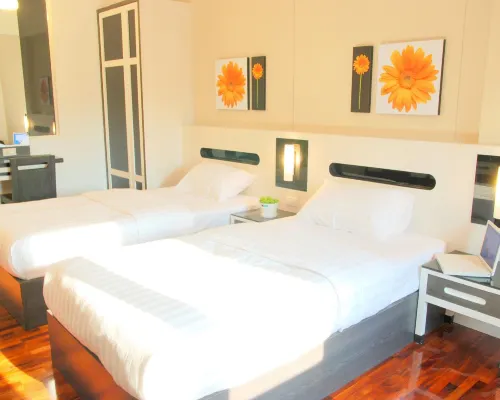ห้องพัก The Inn Saladaeng ตกแต่งสไตล์ร่วมสมัยสะอาดพร้อมเตียงและแอร์