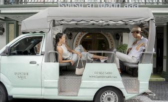 La Petite Salil's complimentary tuk-tuk shuttle to BTS Thong Lo, available around the clock