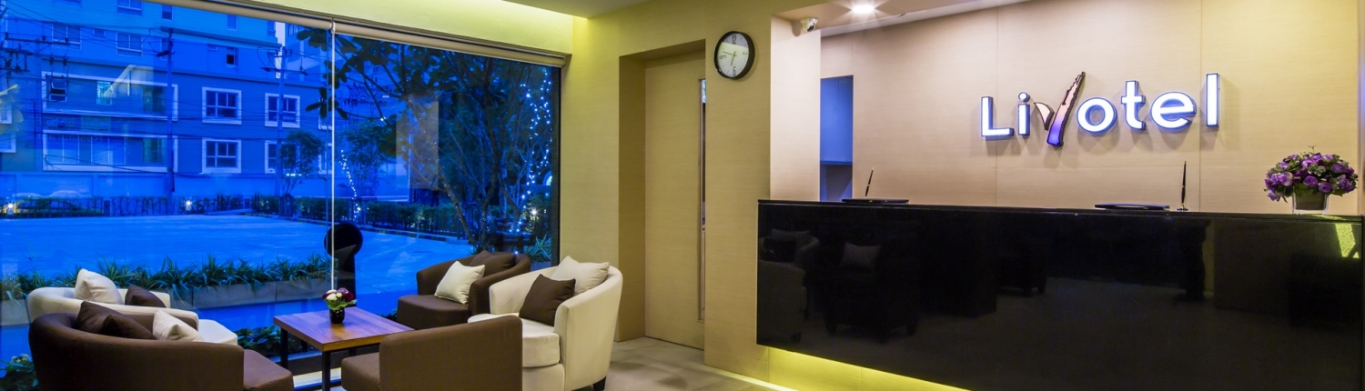 Lobby of Livotel Hotel @ Kaset Nawamin Bangkok, clean and welcoming with a modern reception area