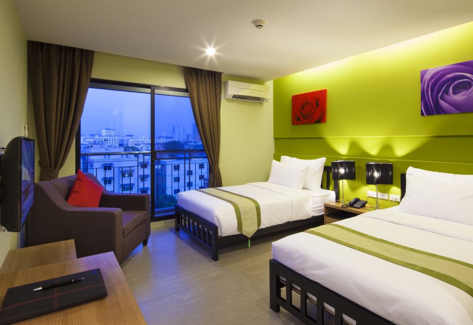 ห้องพักของ Livotel Hotel Lat Phrao Bangkok ตกแต่งเรียบสะอาด เตียงนอนสะดวกสบาย