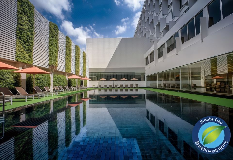 ห้องพักสไตล์คลาสสิกของ Mandarin Hotel Bangkok Centre Point ตกแต่งสะอาด เตียงใหญ่ แสงธรรมชาติดี