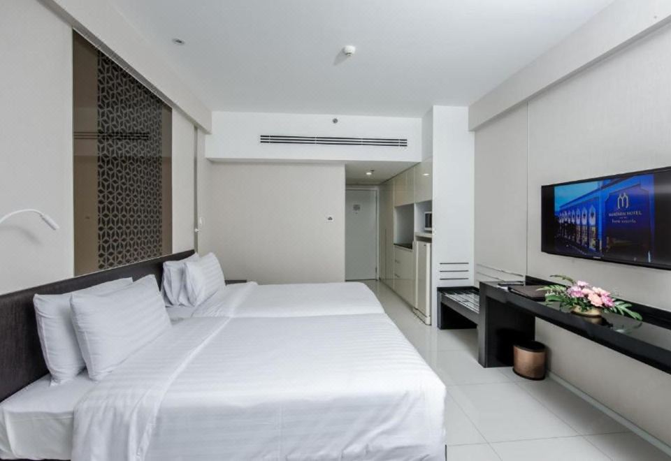 ล็อบบี้สไตล์คลาสสิกของ Mandarin Hotel Bangkok Centre Point บรรยากาศอบอุ่น