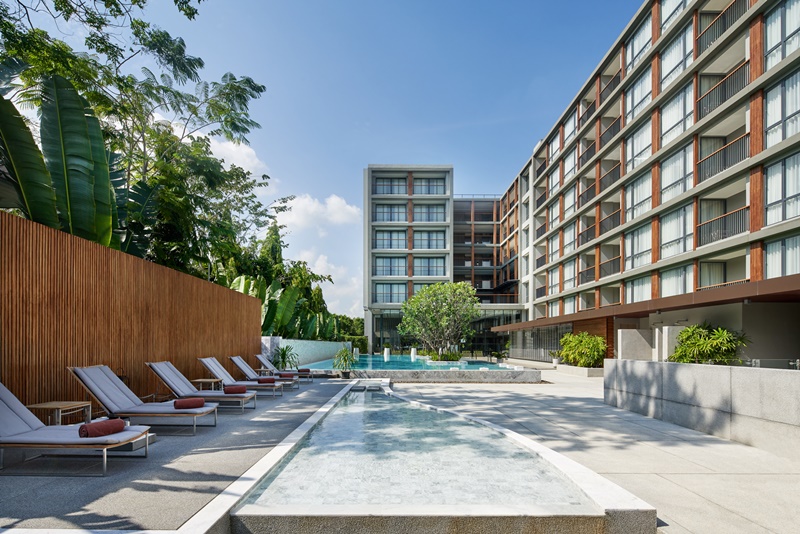 Outdoor saltwater pool at The Park Nine Hotel Suvarnabhumi along the century-old canal
