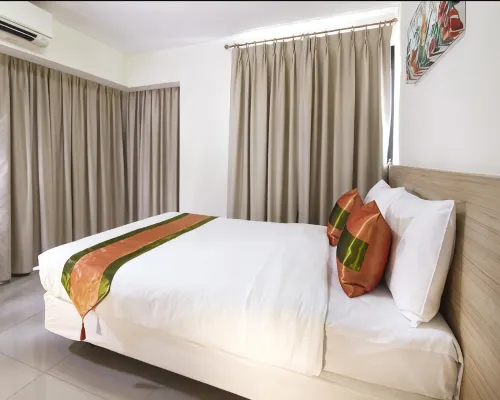 ห้อง One Bedroom Suite ของ The Plimplace Hotel มุมนั่งเล่นแยกต่างหาก