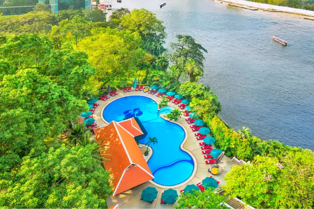 Royal Orchid Sheraton Bangkok outdoor pool on the 5th floor with Chao Phraya River views