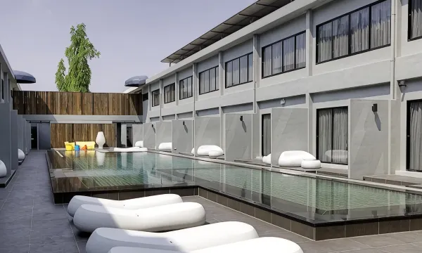 Saltwater outdoor pool at S Ratchada Leisure Hotel, with children's pool and jacuzzi alongside