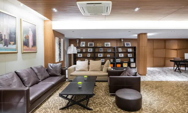 Lobby and lounge area at S Ratchada Leisure Hotel, clean contemporary interior