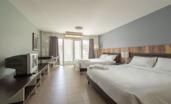 Interior of Sathorn Terrace Apartment Bangkok showing modern furnishings and work desk