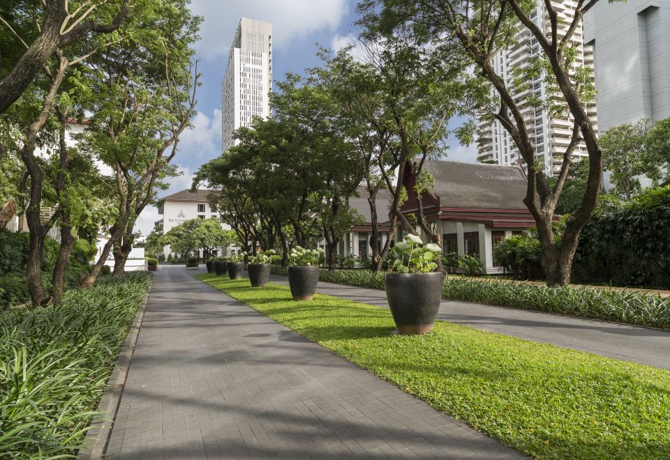Lotus pond and garden courtyard at The Sukhothai Bangkok — a calm retreat within Sathorn CBD