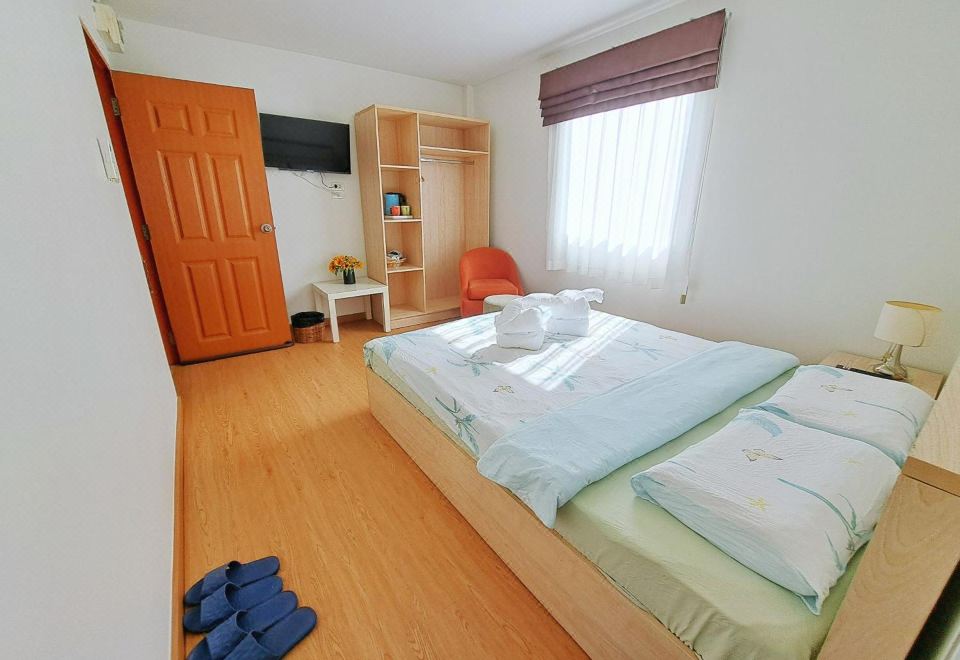 ห้องพักภายใน TD Bangkok Hotel สะอาดเรียบร้อย เตียงจัดแต่งพร้อมพัก