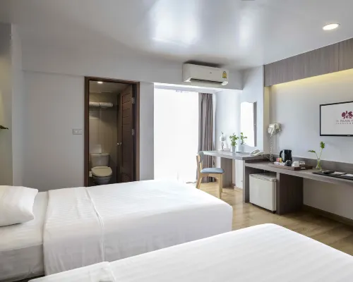 ห้องพัก Standard Room ของ TK Palace Hotel แจ้งวัฒนะ ตกแต่งสะอาดทันสมัย เตียง King หรือ Twin