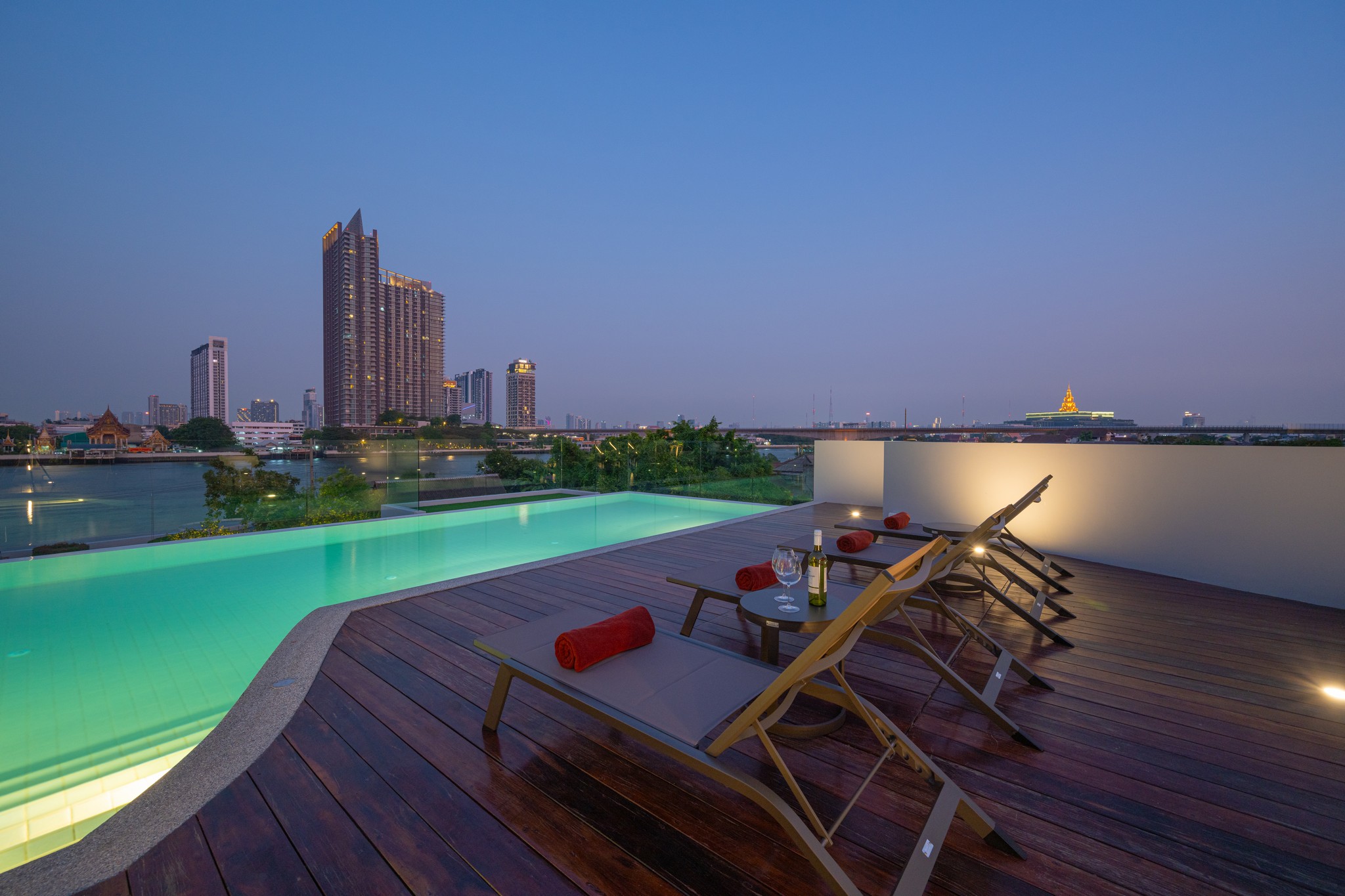 The outdoor saltwater pool at WE Hotel Riverfront overlooking the Chao Phraya River