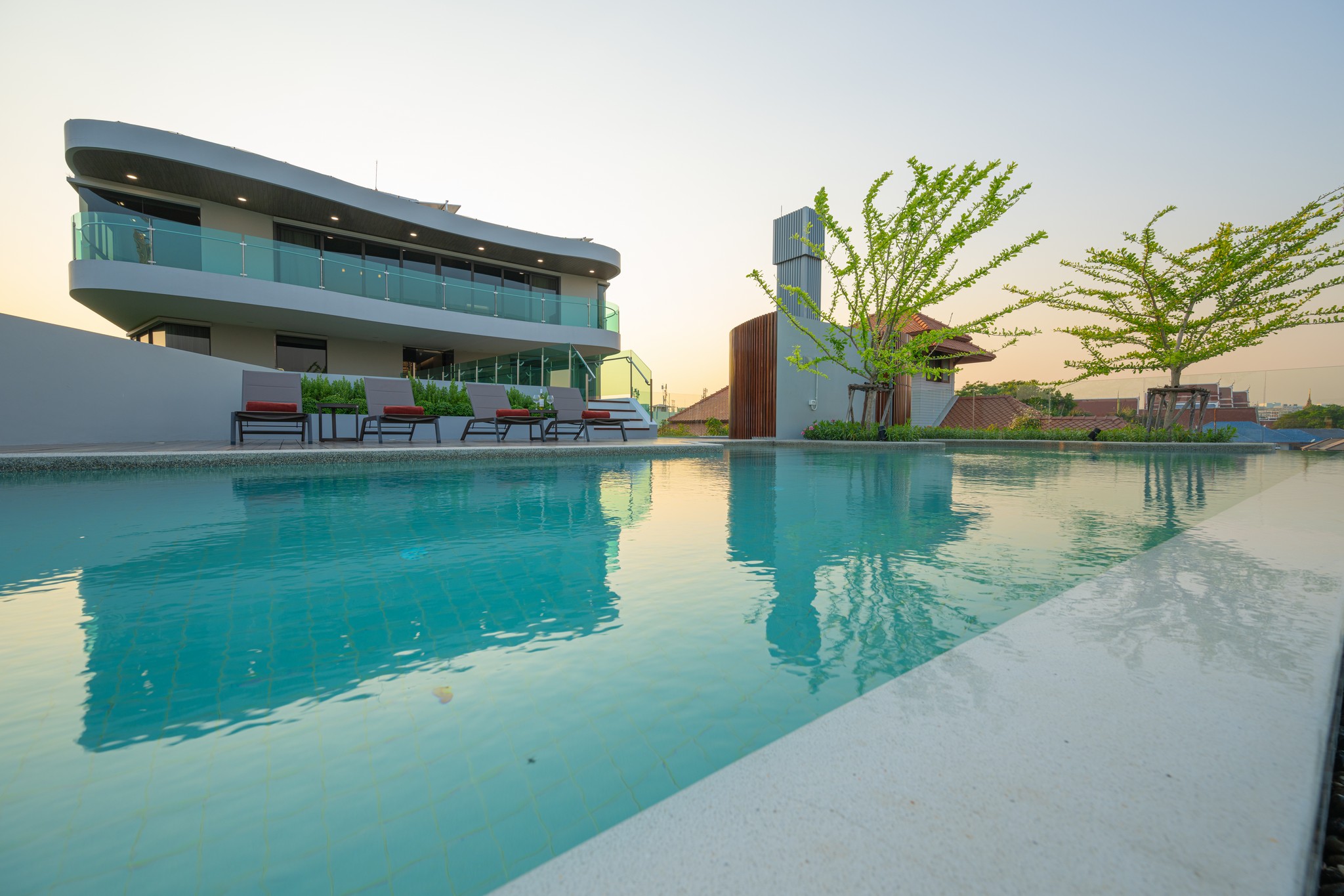 A WE Premier Corner Riverview room at WE Hotel Riverfront with Chao Phraya river views