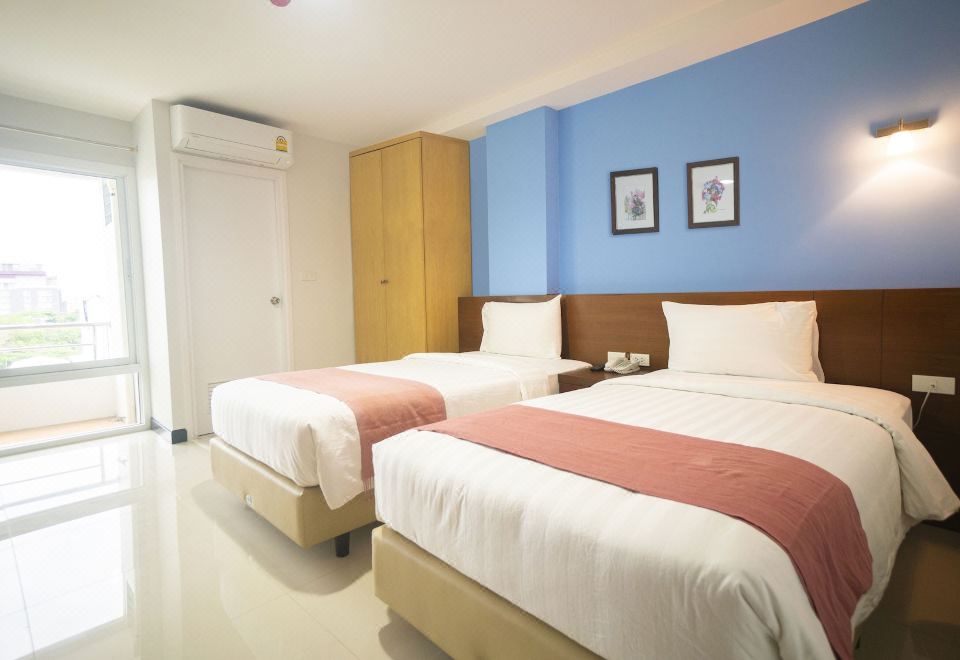 ห้องพักมาตรฐานของ The Willing Hotel and Residence แจ้งวัฒนะ สะอาดเรียบร้อย