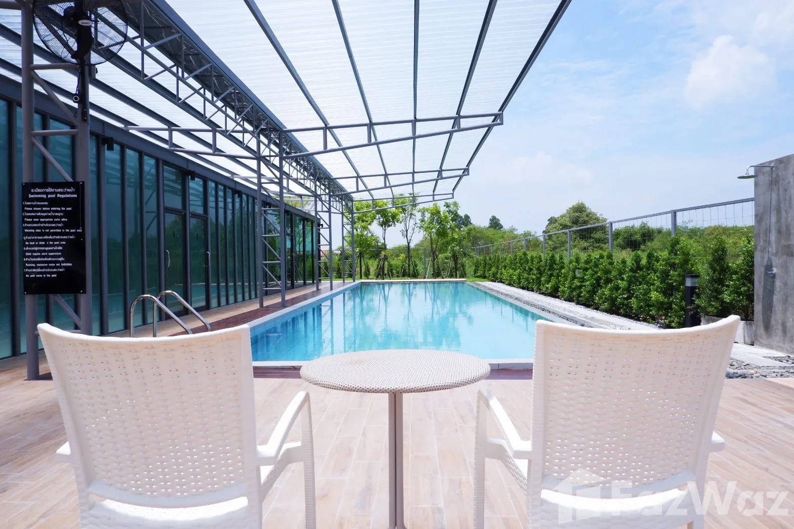 ห้องสตูดิโอของ Udee Condo ฉะเชิงเทรา ตกแต่งครบพร้อมเตียง แอร์ และมุมครัวเล็ก