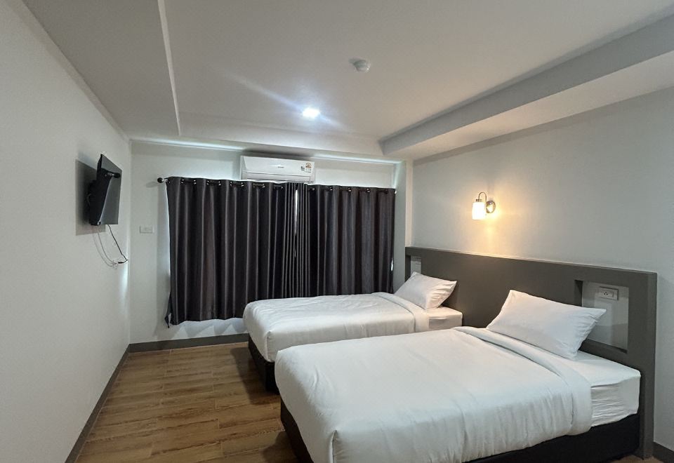 ห้องพักของ Na Care Hotel ชัยภูมิ ตกแต่งใหม่สะอาดตา