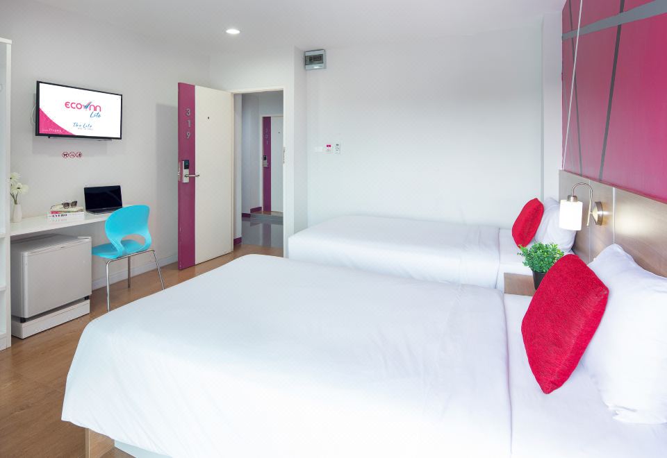 บรรยากาศตัวอาคารและพื้นที่ส่วนกลางของ Eco Inn Lite จันทบุรี