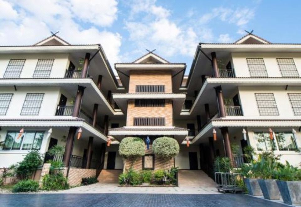 อาคารพักหลังคาทรงไทยของ Diamond Park Inn Chiangrai Resort