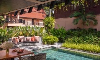 สวนเขตร้อนร่มรื่นภายใน Anantara Hua Hin Resort พร้อมวิลล่าโลว์ไรส์และต้นไม้ใหญ่