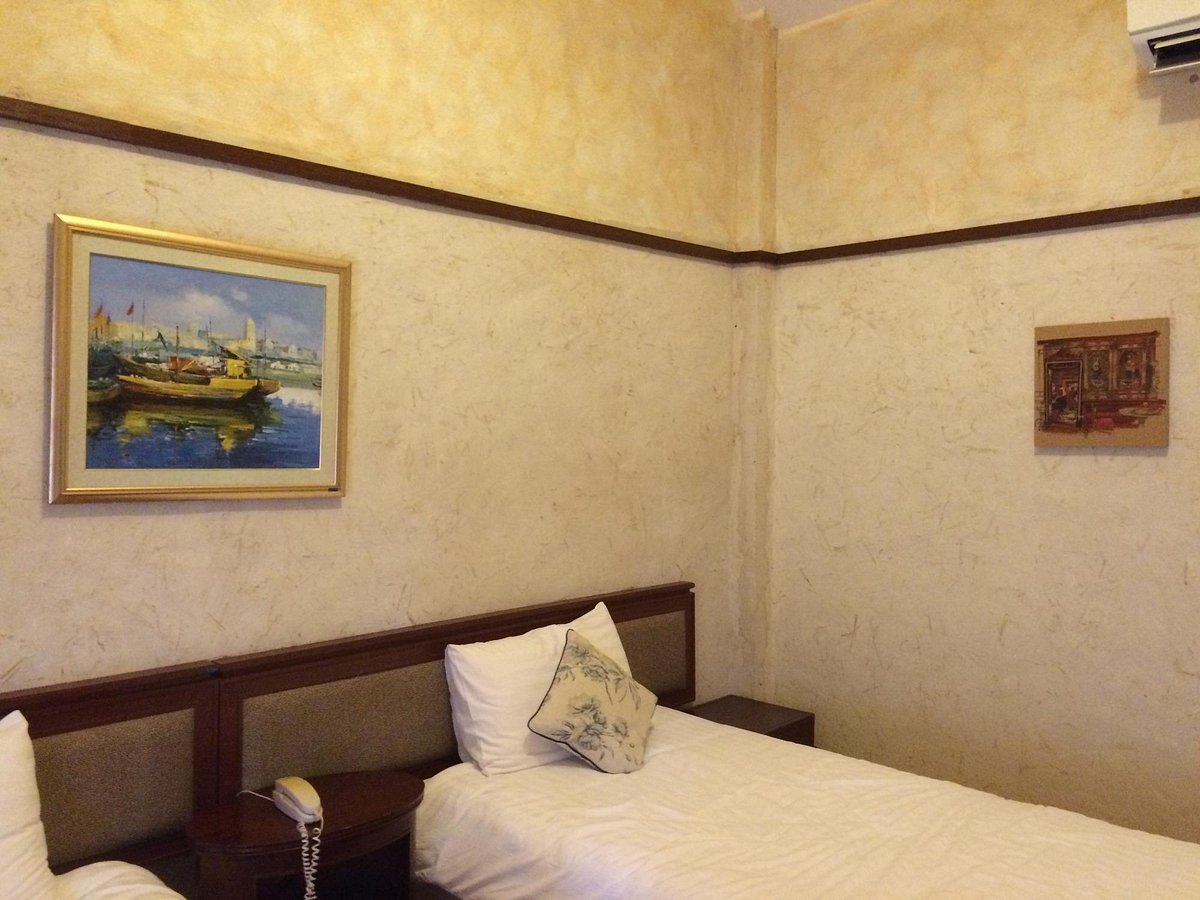 ห้องพัก Palio Inn ตกแต่งโทนขาว เตียงนุ่ม พร้อมระเบียงส่วนตัว