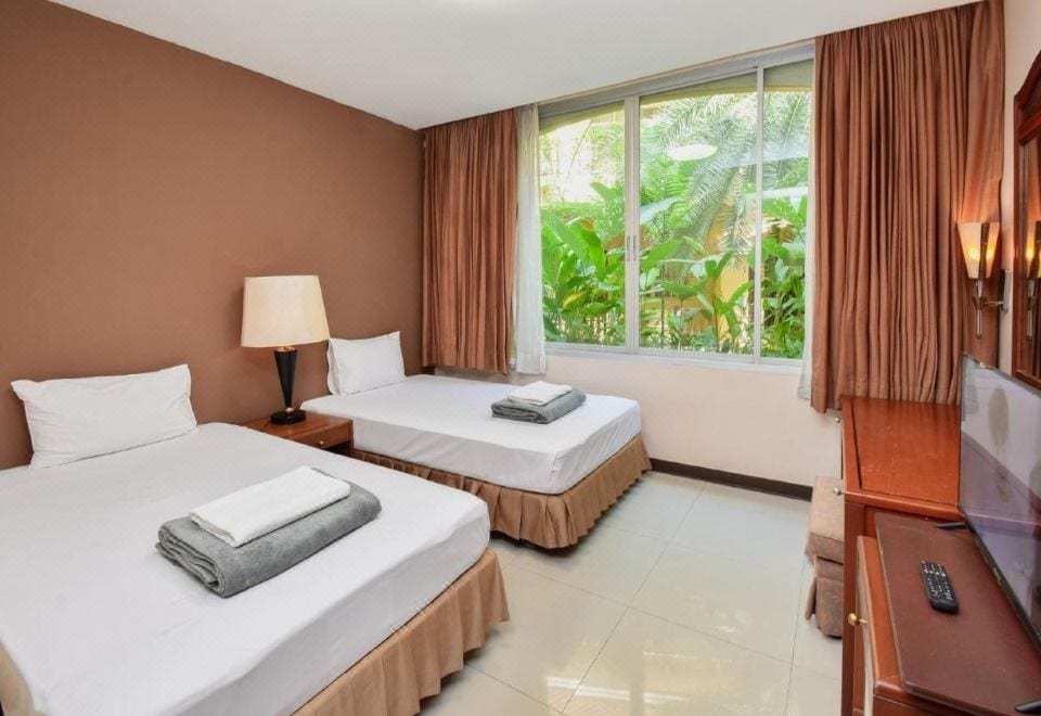 ห้องพักตกแต่งสไตล์บูทีคโทนอบอุ่นของ Piman Garden Boutique Hotel ขอนแก่น