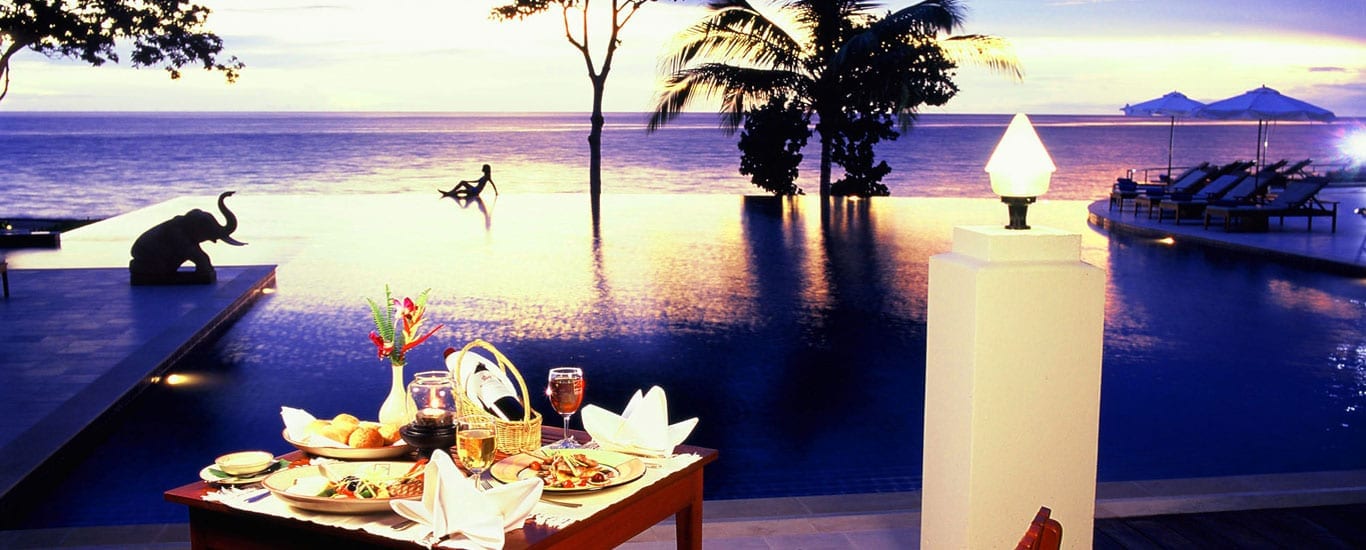 The seaside infinity pool at Chang Buri Resort, looking out over the sea off Koh Chang as a backdrop