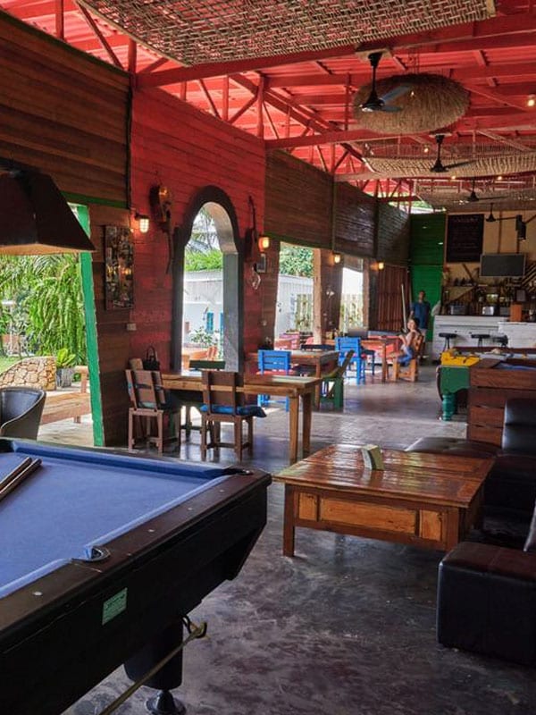 Brightly coloured bar and restaurant at Elephant Bay Resort with a Bailan Bay view on Koh Chang