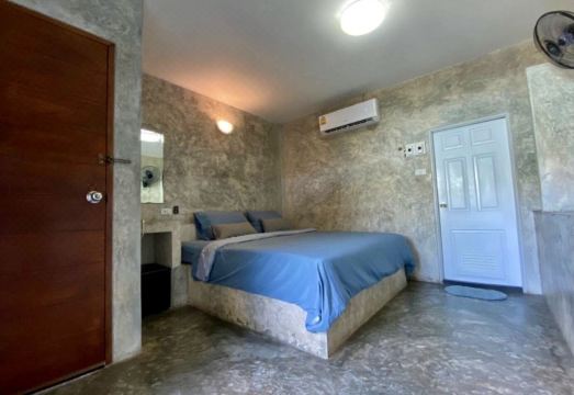 Bright, clean air-conditioned room at At The Beach Koh Larn Resort, Koh Larn