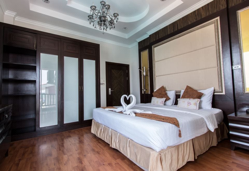 A room at Suntosa Resort Koh Larn with a private balcony and sea view