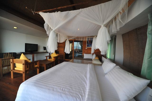 Quiet private beach and calm sea in front of The Cinnamon Art Resort, Koh Mak
