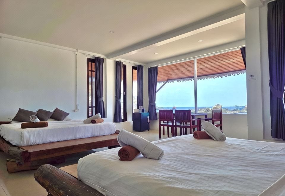 อ่าวโตนดหน้า Mountain Reef Beach Resort เกาะเต่า จุดดำน้ำตื้นน้ำใสเห็นปะการัง