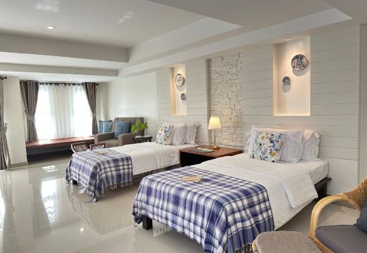 ห้องพักโทนอบอุ่นสไตล์วินเทจของ Nan Boutique Hotel น่าน