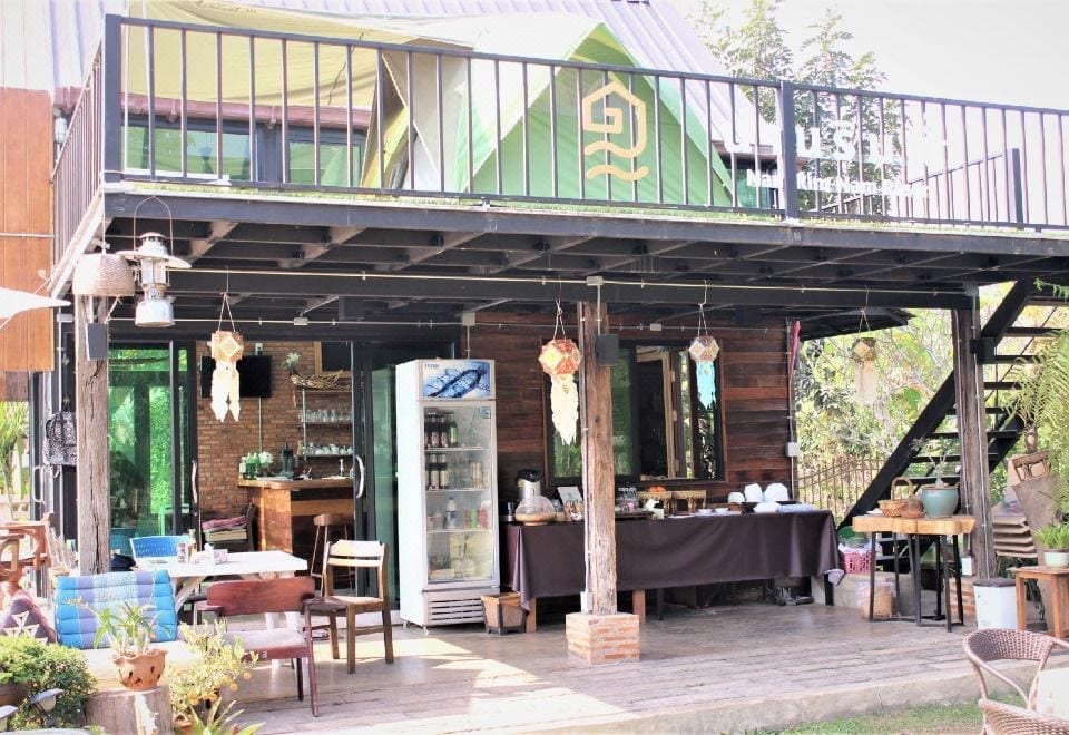 บรรยากาศ NanRimnam น่านริมน้ำ ที่พักริมแม่น้ำน่านพร้อมสวนและต้นไม้ร่มรื่น
