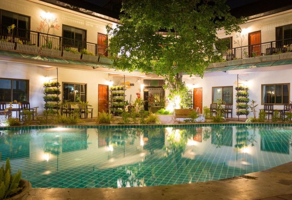 ห้องพักดีไซน์เรียบโทนอบอุ่นพร้อมเตียงสบายที่ Medio De Pai