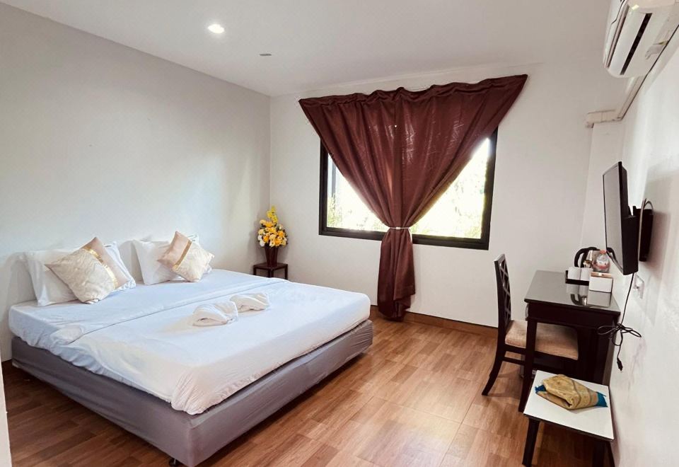 บ้านไม้ยกพื้นสไตล์มลายูของ Bakkahland Farm and Resort กลางสวนเขียว