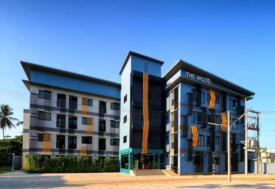 ห้องพักของ The Wood Pattani Hotel ตกแต่งโทนไม้อบอุ่น เตียงนุ่ม