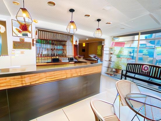 มุมต้อนรับและทางเข้า Phang Nga Guesthouse บนถนนเพชรเกษม