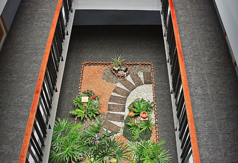 ห้องพักของ Merdelong Hotel พัทลุง เตียงนุ่ม สะอาด ปรับอากาศ