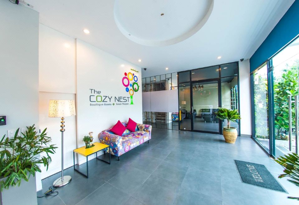The Cozy Nest Boutique Rooms