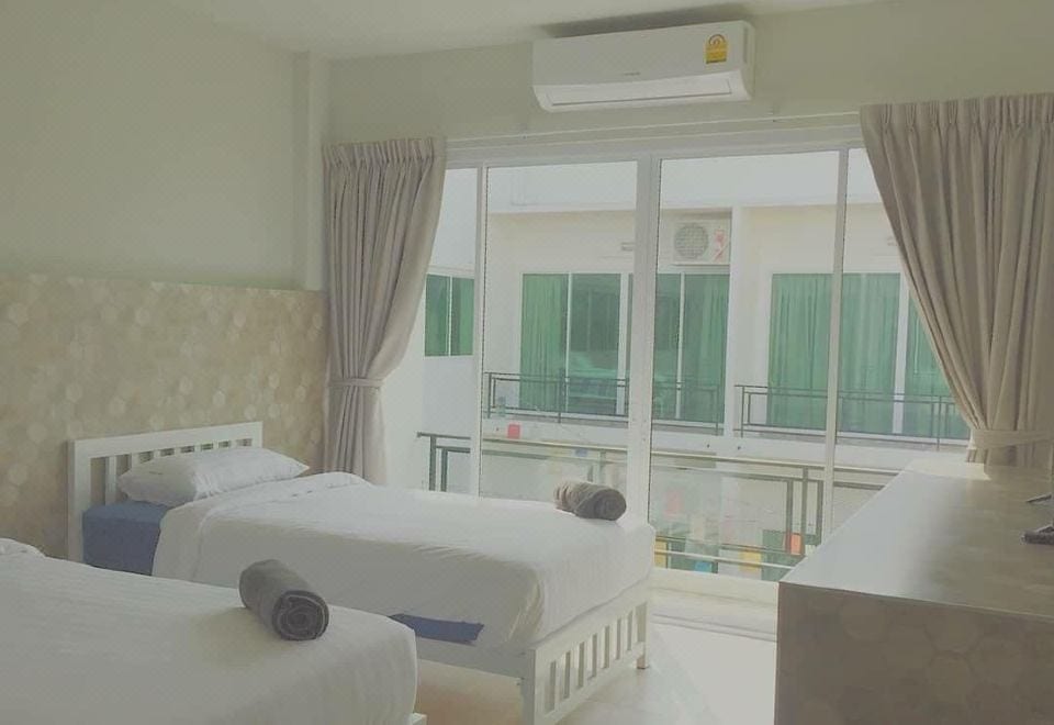 ห้องพักภายใน Kosit One Hotel บึงสามพัน เพชรบูรณ์ ตกแต่งเรียบง่ายสะอาดตา เตียงนอนสบาย