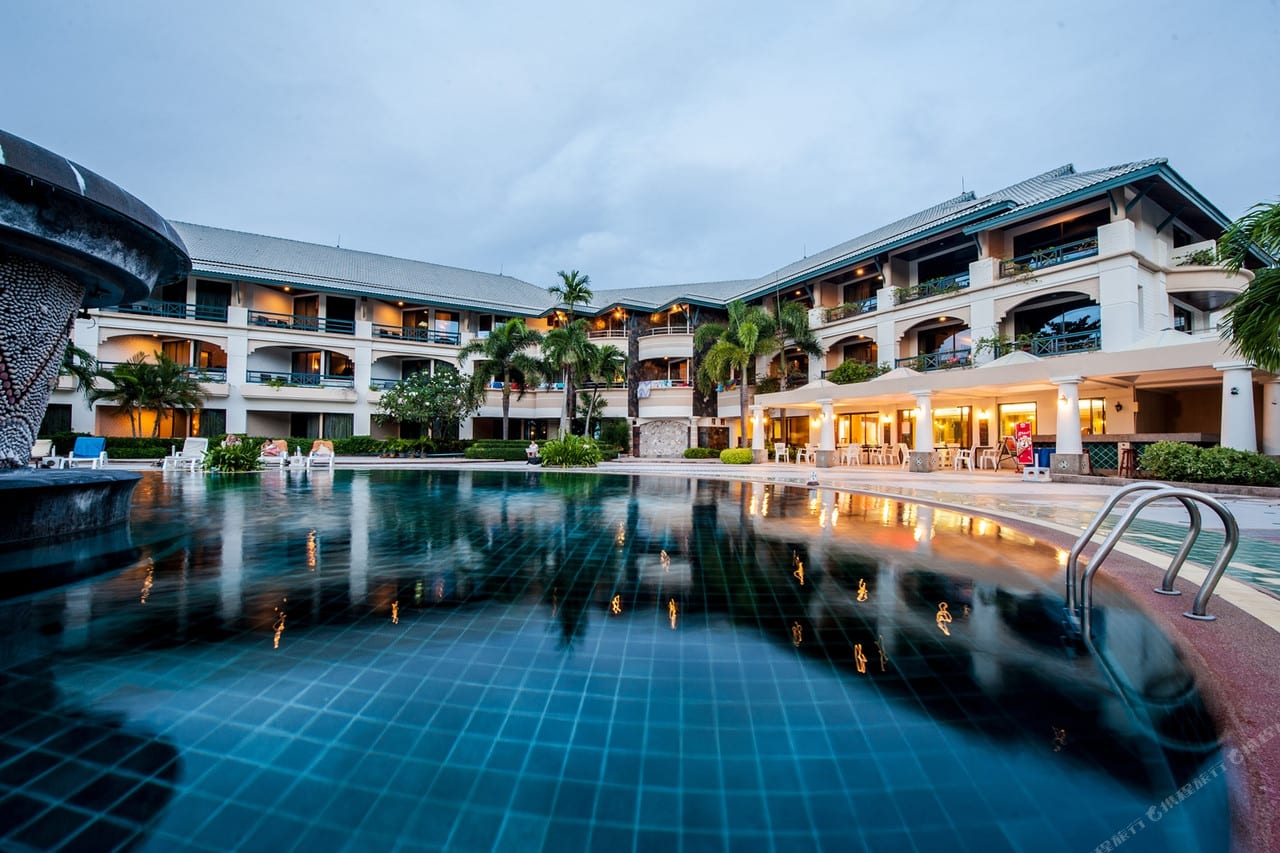 The outdoor swimming pool at Phi Phi Island Cabana Hotel looking out toward Loh Dalum Bay and the limestone cliffs