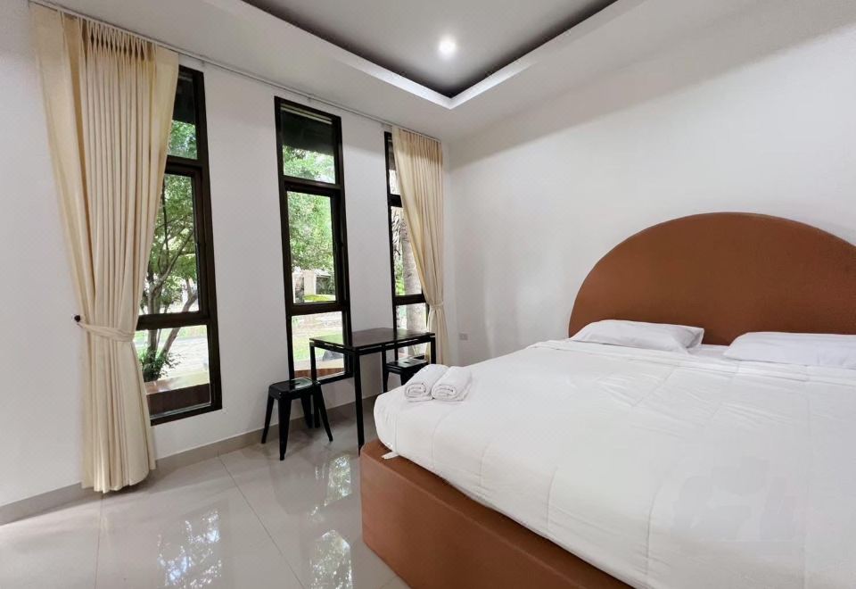 ห้องพัก Deluxe ของ Lanna Bali Kumnuntuo พิจิตร ตกแต่งธีมล้านนา-บาหลี วิวสวน